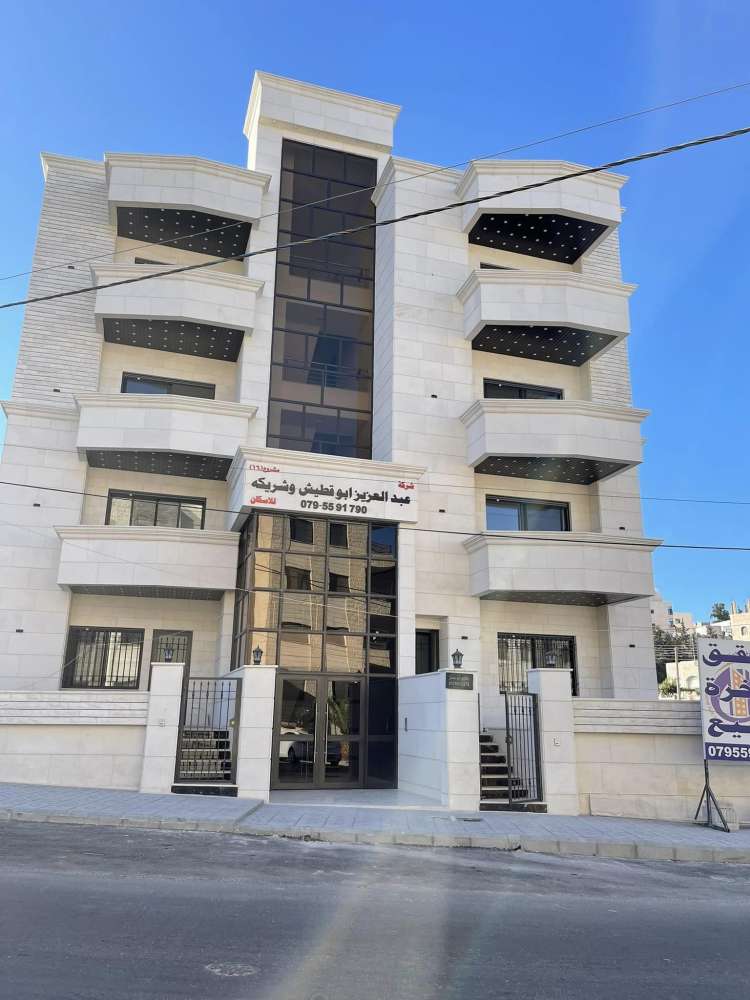 Abdelaziz Abu Qtaish and his partner for housing